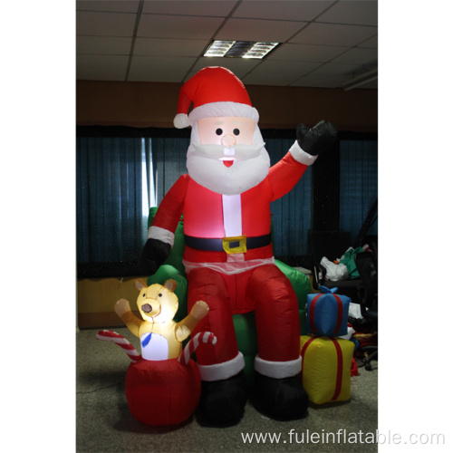 Giant inflatable Santa in Sofa for Christmas decoration